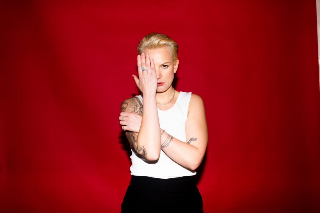 ENOLA announces debut EP All Is Forgiven and shares new single ‘Looking Back’