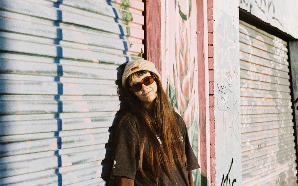 Hassall continues to tease debut LP with new single ‘Overpopulator’